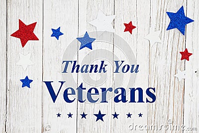 Veterans Day message with stars on a weathered whitewash wood Stock Photo