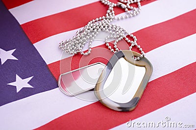 Veterans Day USA Flag with dog tags Stock Photo
