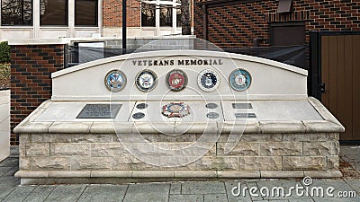 Veterans Memorial just adjacent to the Old Well House in front of City Hall in Lewisville, Texas. Editorial Stock Photo