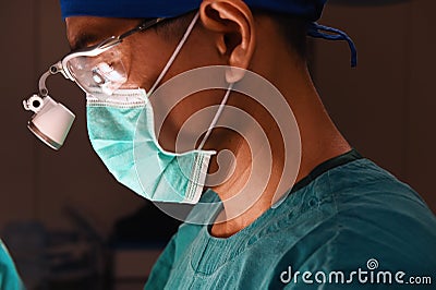 A veterinarian surgeons in operating room Editorial Stock Photo