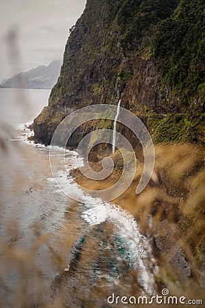 Veu da Noiva Viewpoint of Waterfall falling into the Ocean, Madeira, Portugal Stock Photo