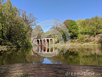 Viaduct Reflections in Pond Stock Photo