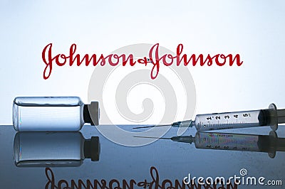 Vial and syringe silhouette on reflective surface with Johnson & Johnson logo on the background Editorial Stock Photo