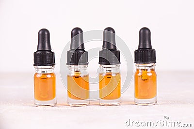 Vials of CBD oil, cannabis live resin extraction isolated on white - medical marijuana concept Stock Photo