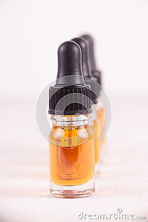 Vials of CBD oil, cannabis live resin extraction isolated on white - medical marijuana concept Stock Photo