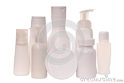 vials of cosmetics, white scent-bottles, cosmetic bottles, assortment of cosmetic flasks, pile of scent-bottles, Stock Photo