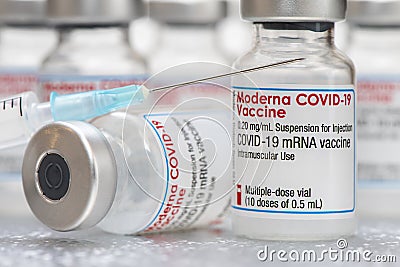 Vials with the Moderna Covid-19 vaccine are used at the corona vaccination centres worldwide Editorial Stock Photo