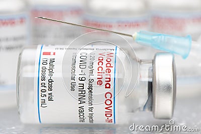 Vials with the Moderna Covid-19 vaccine are used at the corona vaccination centres worldwide Editorial Stock Photo