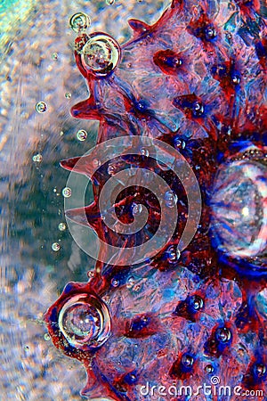 Vibrant Abstract Glass Swirls and Bubbles from a Paperweight with Lines and Colours Stock Photo