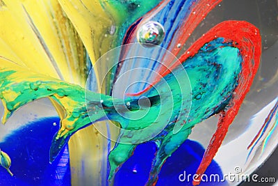 Vibrant Abstract Glass Swirls and Bubbles from a Paperweight with Lines and Colours Stock Photo