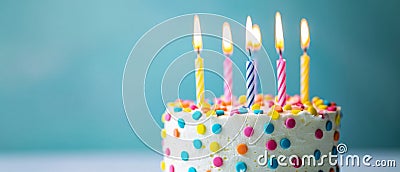 Vibrant Birthday Cake With Six Lit Candles, Against A Soft Blue Background Stock Photo