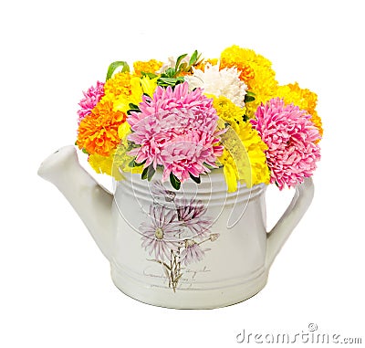 Vibrant colored Chrysanthemum flowers in a white watercan, bouquet, close up, floral arrangement Stock Photo