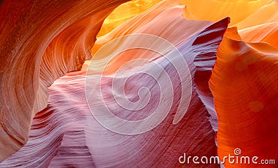 Vibrant colors of eroded sandstone rock in slot canyon, antelope Stock Photo