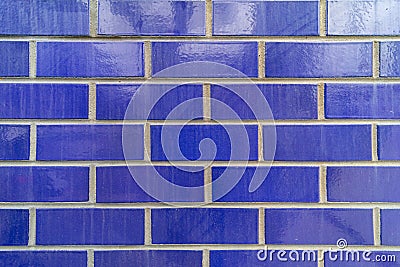 Vibrant dark blue tiles on a wall of a building Sydney NSW Australia Stock Photo