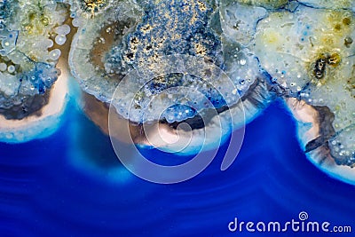 Vibrant deep blue and semi-transparent agate geode slice crystal Stock Photo