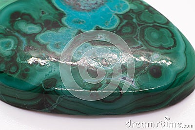 Vibrant Green and blue malachite chrysocolla cabochon polished crystal Stock Photo