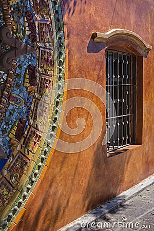 Vibrant Mosaic and Window in Mexican Sunlight Stock Photo