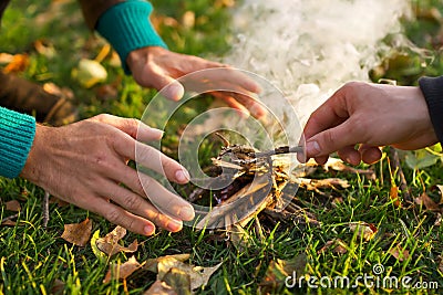 Vibrant outdoor background, lighting fire. Stock Photo