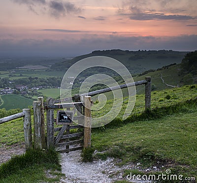 Vibrant sunrise over countryside landscape Stock Photo