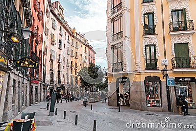 A vibrant weekend morning on the Calle Cava de San Miguel, Madrid, Spain Editorial Stock Photo