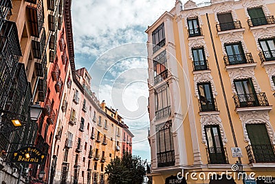 A vibrant weekend morning on the Calle Cava de San Miguel, Madrid, Spain Editorial Stock Photo