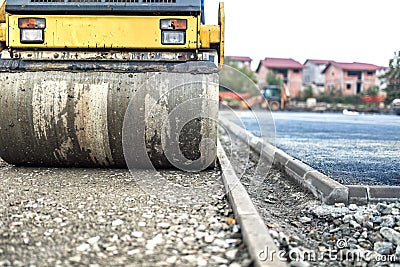 Vibration roller compactor at road construction and reparing asphalt pavement. compactor working Stock Photo