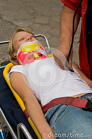 Victim on stretcher Stock Photo