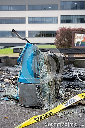 Melted blue plastic from a portable toilet fire Editorial Stock Photo