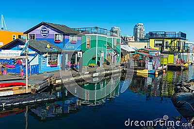 VICTORIA BC CANADA FEB 12, 2019: Victoria Inner Harbour, Fisherman Wharf is a hidden treasure area. With colorful floating homes, Editorial Stock Photo