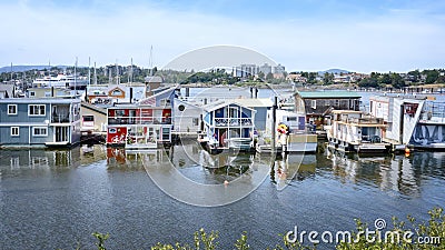 Victoria city Inner Harbor landscape. Village of colorful floating houses. Fisherman Wharf in Victoria, Vancouver Island, Stock Photo