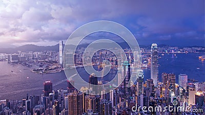 Victoria Harbor Day and Night Editorial Stock Photo