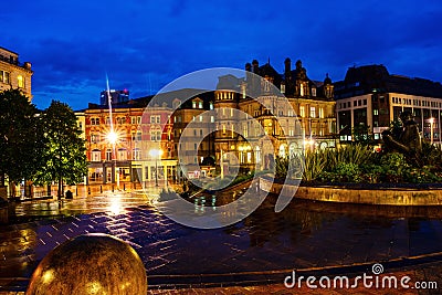 Victoria square at night with illuminated buildings, cafes, shops and hotels in Birmingham, UK Stock Photo