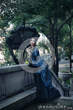 Victorian lady in blue Stock Photo
