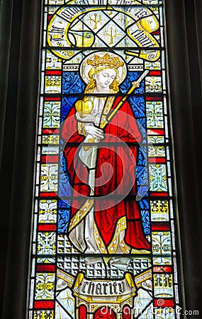 Victorian Stained Glass Window of Charity Editorial Stock Photo