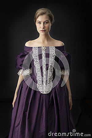 Victorian, 18th century, or renaissance woman in a silk dress Stock Photo