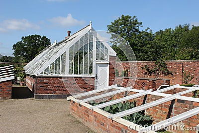 Victorian walled garden and greenhouse Stock Photo