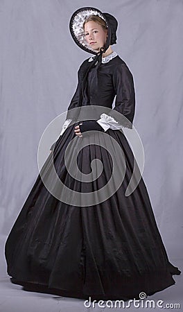 Victorian woman in black bodice. bonnet and skirt Stock Photo