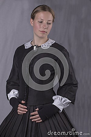 Victorian woman in black bodice and skirt Stock Photo