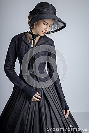 Victorian woman in black ensemble Stock Photo