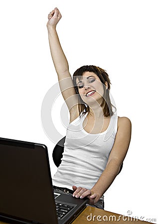 Victorious girl with laptop computer Stock Photo