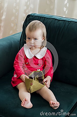 Victory Day Russia Baby girl in a military cap at home Stock Photo