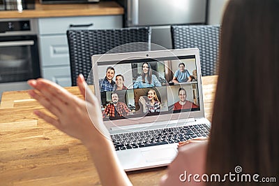 A young woman using laptop for video call, zoom Stock Photo