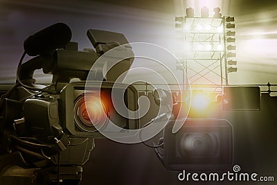 Video camera camcorder in stadium for making sport news. Stock Photo