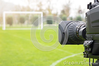 Video camera put on the back of football goal for broadcast on TV sport channel. football program can `t editing in studio Stock Photo