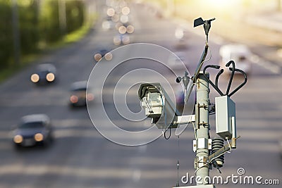 video camera on the road, against the background of cars. commit violations of speed limits, rules of the road Stock Photo