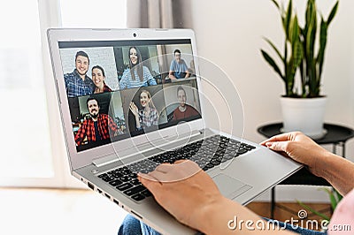 A young woman using laptop for video call, zoom Stock Photo