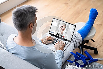 Video Conference Call With Doctor. Man Stock Photo