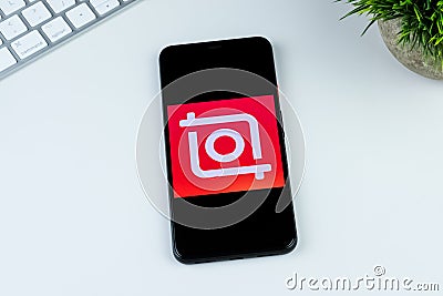 Video Editor & Video Maker - InShot app logo on a smartphone screen. Editorial Stock Photo