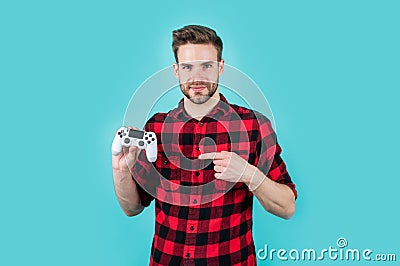 Video games addicted young guy play with console. man playing video game with controller. bearded man using virtual Stock Photo