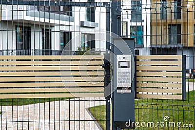 Video intercom on the gate at the entrance to the residential area Stock Photo